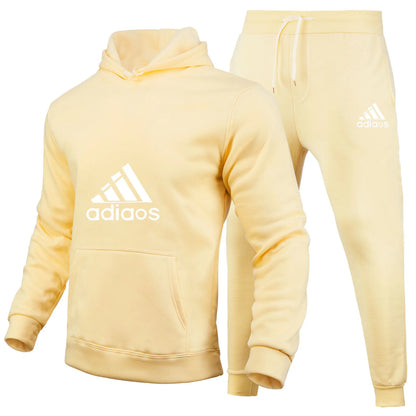 Stylish and trendy fitness jogging loose sportswear set of 2-piece pullover hoodie and long pants for men in autumn and winter